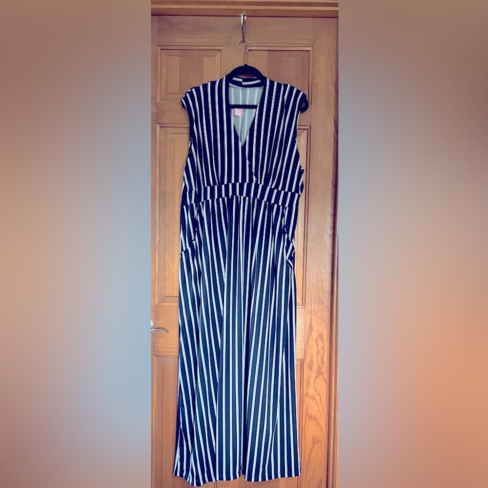 Navy and white striped sleeveless jumpsuit. Brand: Flirty Pink from Zulily.